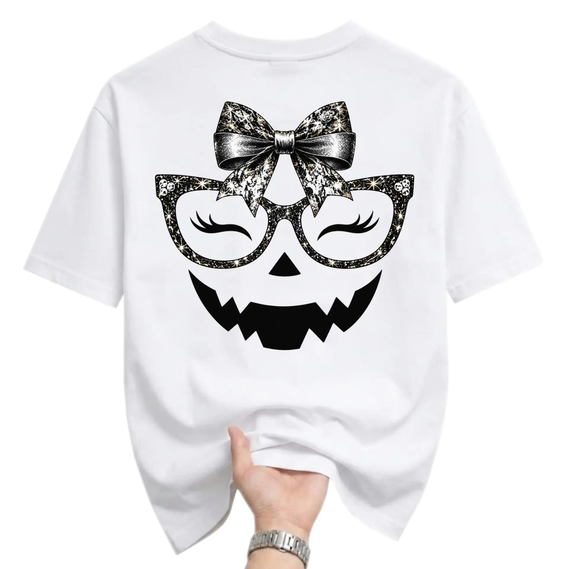 Graphic Tee Unisex Crew Neck T-Shirt Featuring a Glittery Pumpkin Face with Glasses and a Bow Design for Seasonal Wear