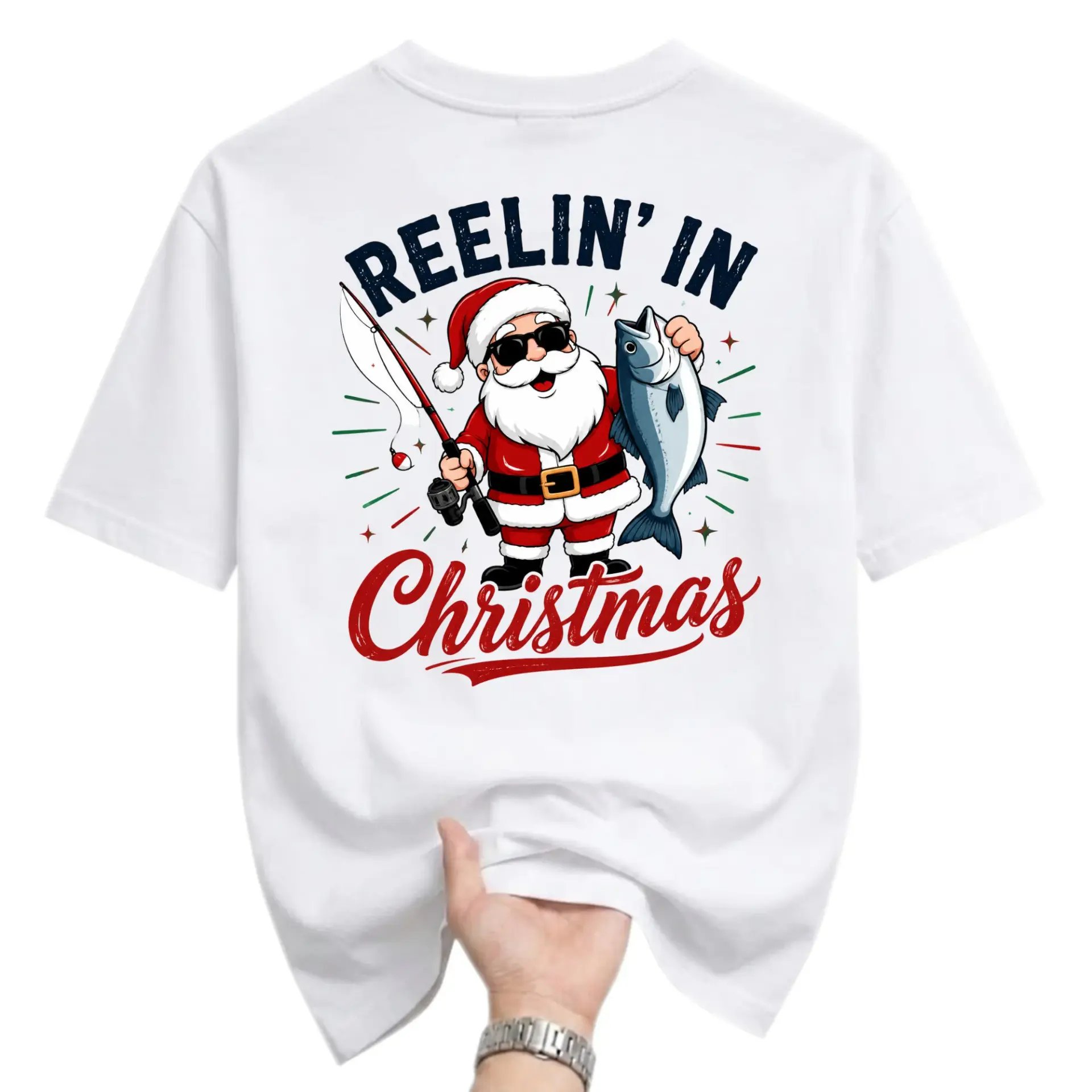 Graphic Tee Reelin in Christmas Santa Fishing Unisex T-Shirt Funny Holiday Seasonal Apparel for Casual Outfits